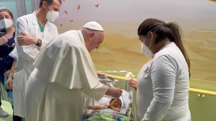 Pope feeling better, visits young patients and baptises baby in hospital