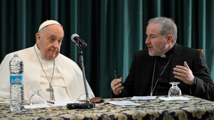 Pope visits with 35 priests at St. Henry parish in Rome